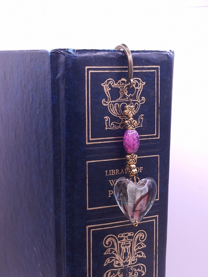 Brass-tone antiqued bookmark with purple marbled bead and translucent heart charm, and earrings